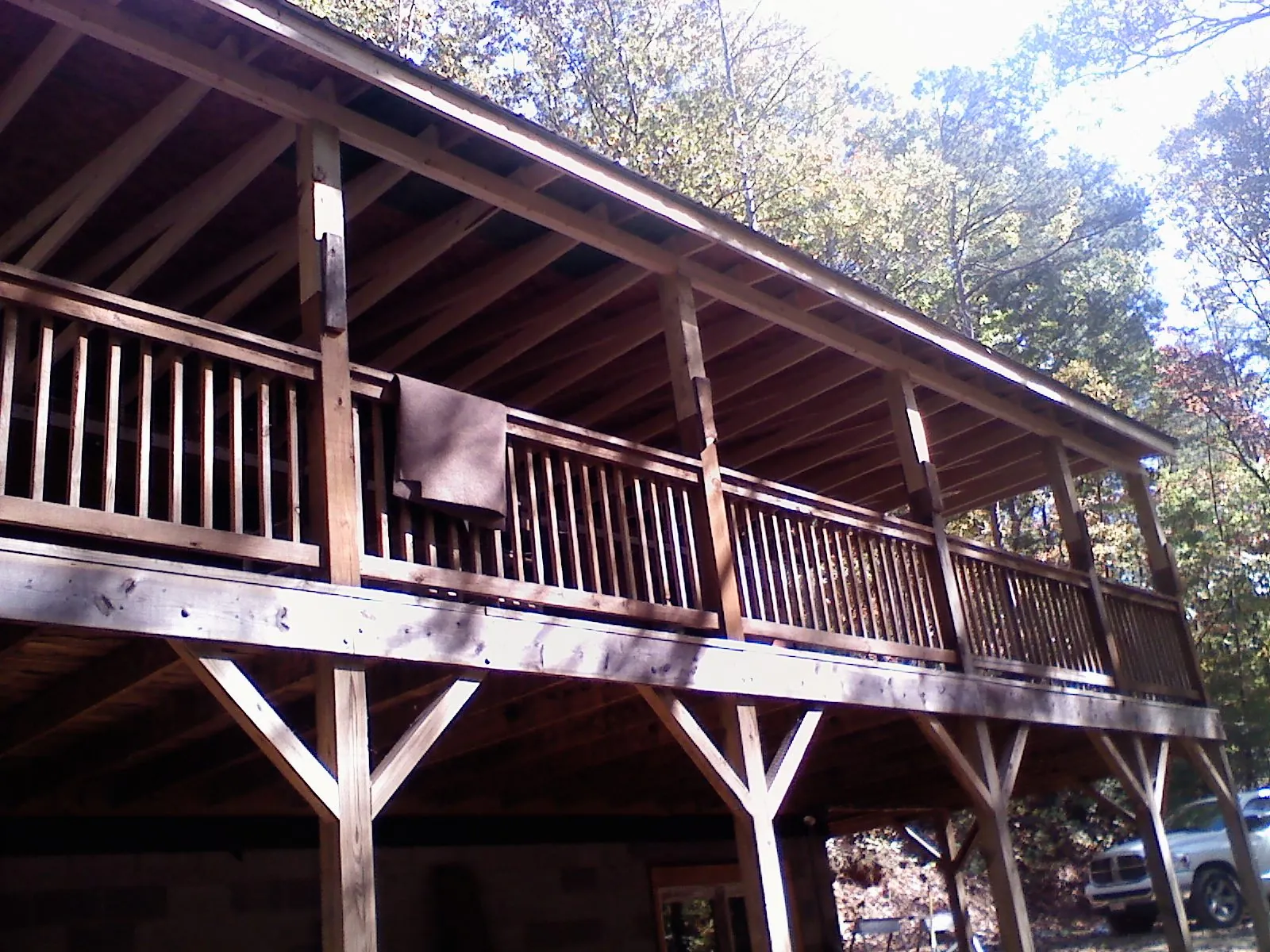 Timber framing under a new elevated porch and deck — Roof Leak Repair in White Sulphur Springs by Roofing Brothers